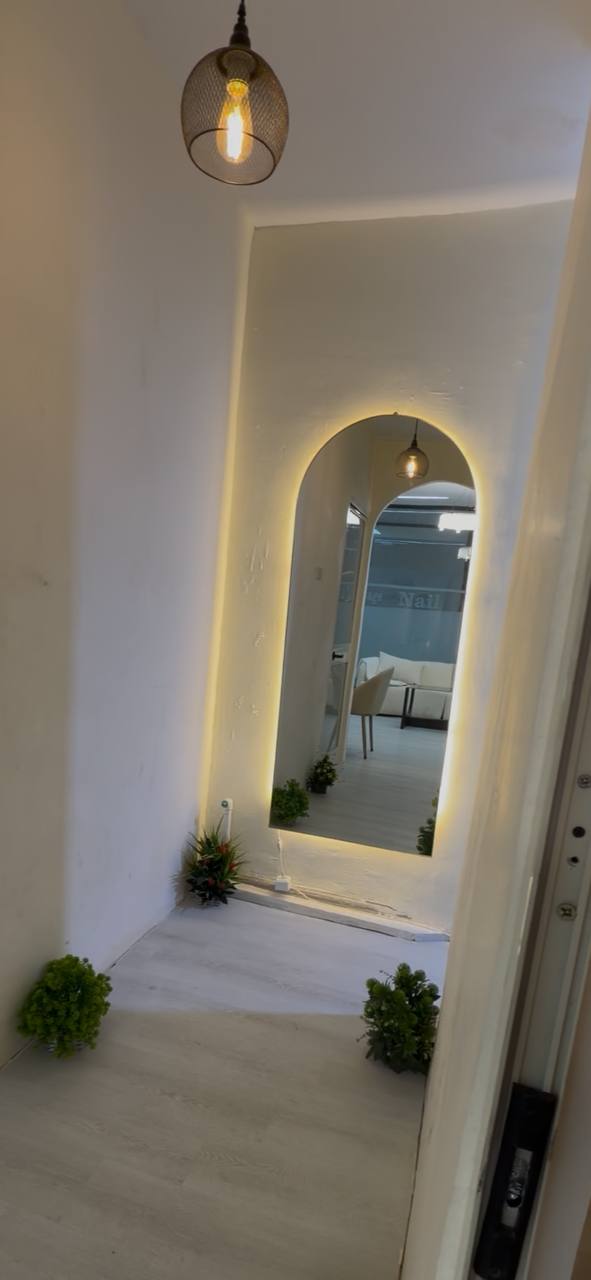 Full salon interior view with tropical plants at Yen Skin Solution